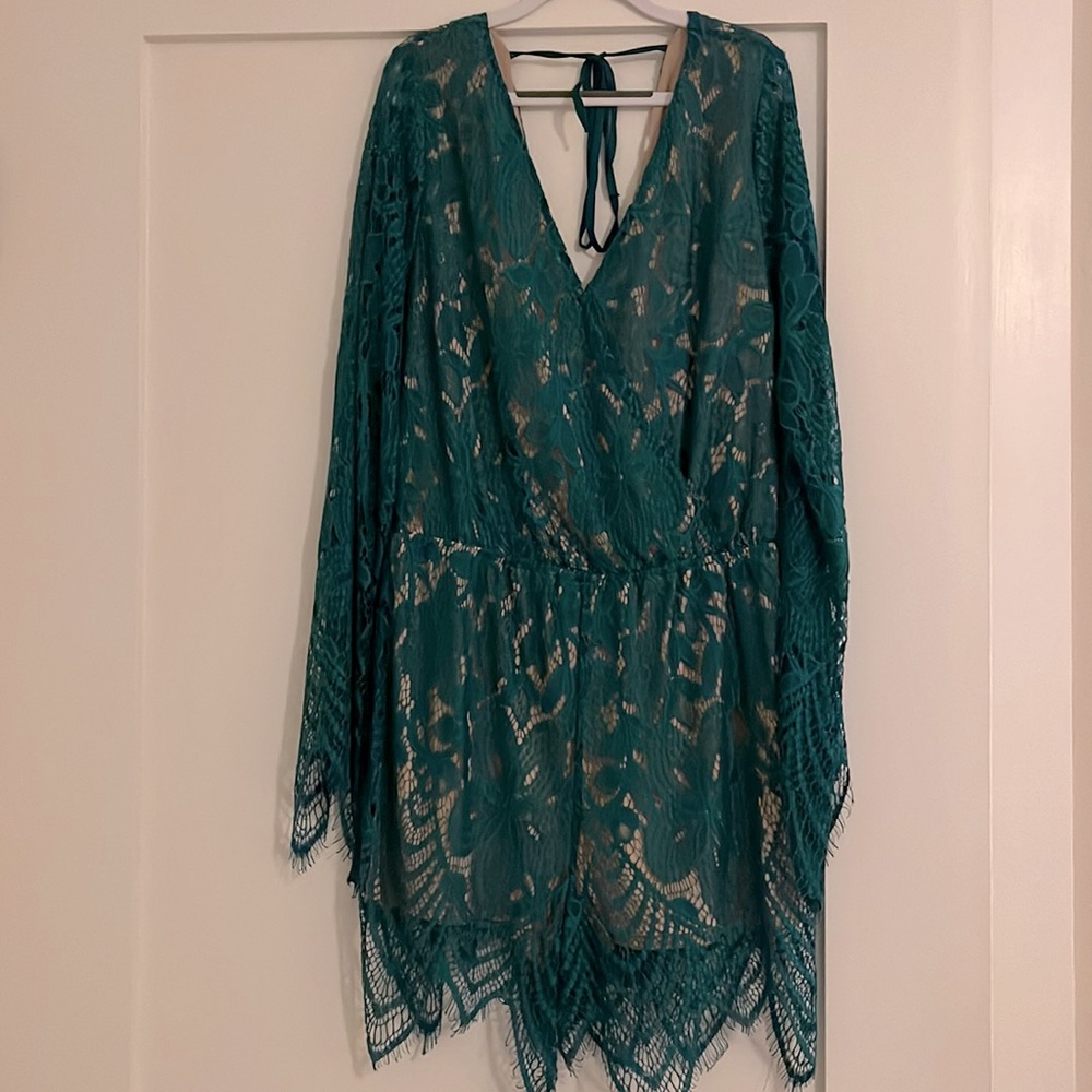 Emerald green lace romper, lined. Plunging neck line and back. Worn once.